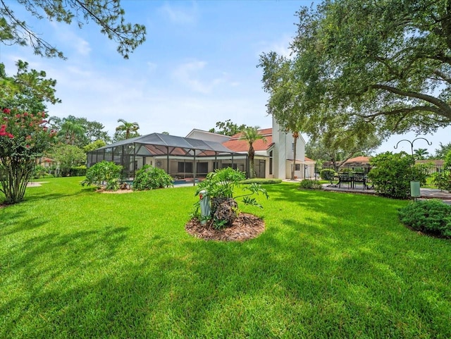 4118 Carrollwood Village Dr, Tampa, FL 33618 - view of grassy yard with glass enclosure