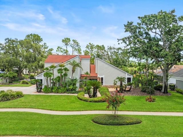 4118 Carrollwood Village Dr, Tampa, FL 33618 - view of front of property with a front yard