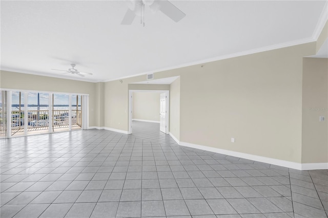 423 150th Ave Unit 1501, Madeira Beach, FL 33708 - empty room with a ceiling fan, ornamental molding, and light tile patterned floors