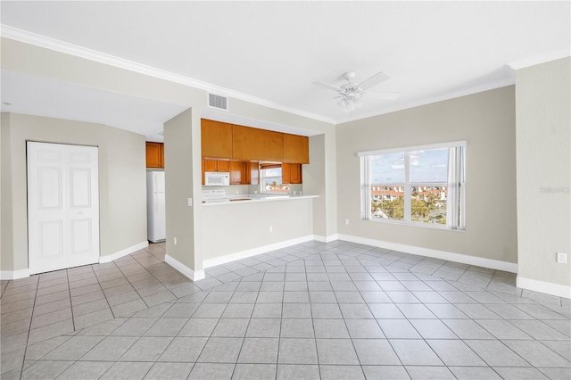 423 150th Ave Unit 1501, Madeira Beach, FL 33708 - unfurnished living room featuring ceiling fan, light tile patterned floors, and ornamental molding