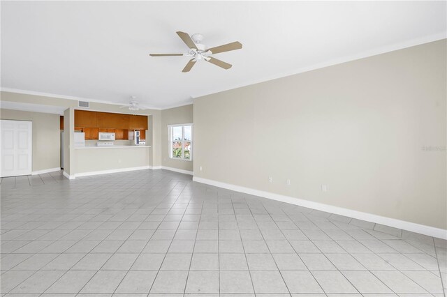 423 150th Ave Unit 1501, Madeira Beach, FL 33708 - unfurnished living room with a ceiling fan, crown molding, and light tile patterned floors