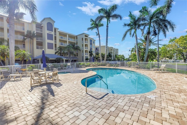 423 150th Ave Unit 1501, Madeira Beach, FL 33708 - community pool with a patio