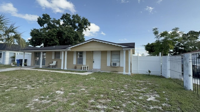 7206 Reindeer Rd, Tampa, FL 33619 - view of front of property featuring covered porch and cooling unit