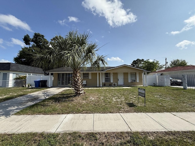 7206 Reindeer Rd, Tampa, FL 33619 - ranch-style house with a porch and driveway