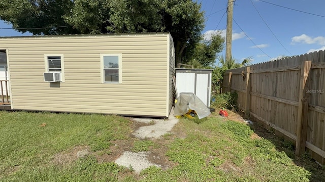 7206 Reindeer Rd, Tampa, FL 33619 - view of outdoor structure with cooling unit