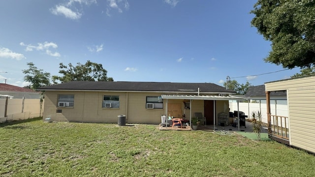 7206 Reindeer Rd, Tampa, FL 33619 - rear view of house featuring a patio and cooling unit