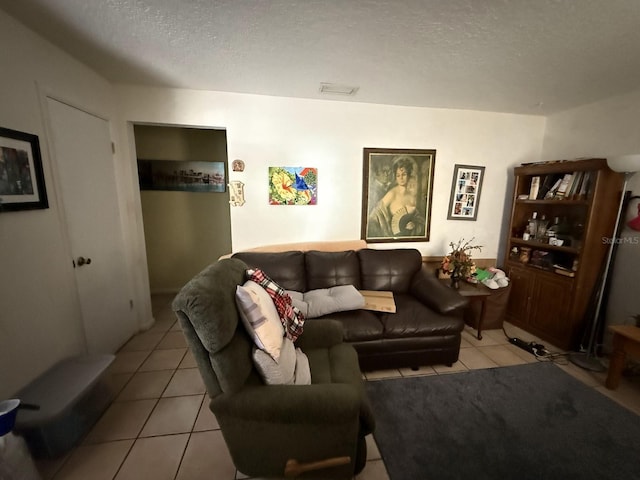 7206 Reindeer Rd, Tampa, FL 33619 - tiled living area with a textured ceiling