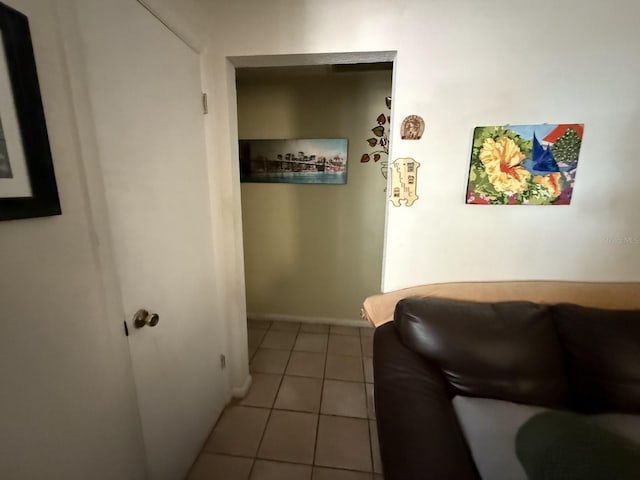 7206 Reindeer Rd, Tampa, FL 33619 - corridor with tile patterned flooring and baseboards