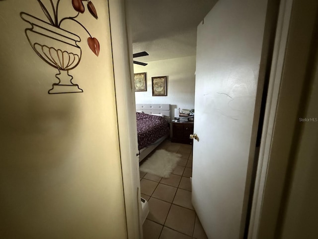 7206 Reindeer Rd, Tampa, FL 33619 - hallway with light tile patterned flooring