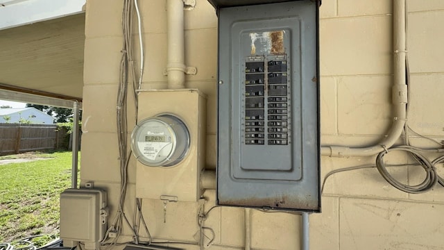 7206 Reindeer Rd, Tampa, FL 33619 - utility room featuring electric panel and electric meter
