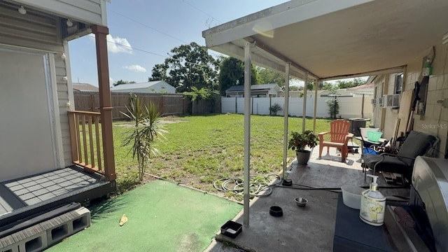 7206 Reindeer Rd, Tampa, FL 33619 - fenced backyard featuring a patio