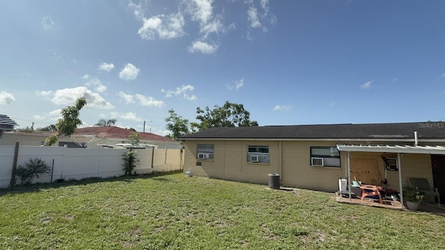 7206 Reindeer Rd, Tampa, FL 33619 - back of property featuring cooling unit and concrete block siding