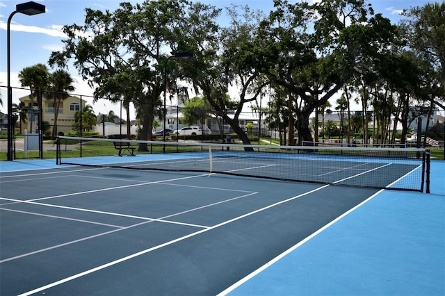 6513 Sand Shore Ln, New Port Richey, FL 34652 - view of tennis court featuring community basketball court