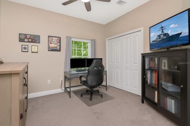 6513 Sand Shore Ln, New Port Richey, FL 34652 - home office with carpet flooring and ceiling fan