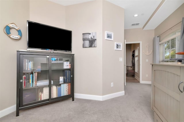 6513 Sand Shore Ln, New Port Richey, FL 34652 - bedroom with light colored carpet and baseboards