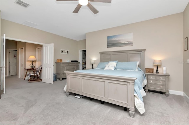 6513 Sand Shore Ln, New Port Richey, FL 34652 - bedroom with light carpet and a ceiling fan