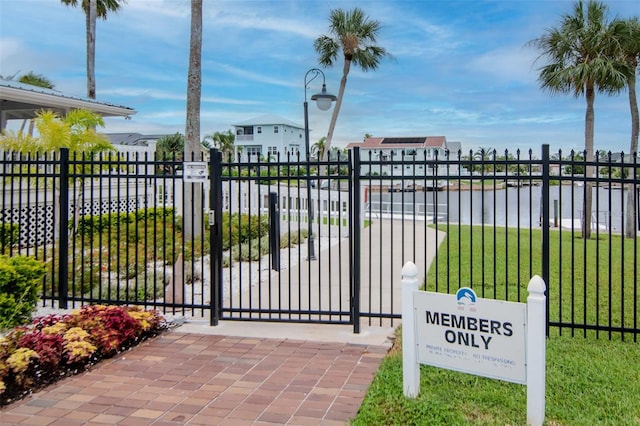 6513 Sand Shore Ln, New Port Richey, FL 34652 - gate featuring a water view