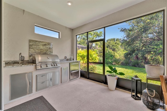 5320 Morey Farms Loop, Palmetto, FL 34221 - sunroom featuring exterior kitchen and a sink