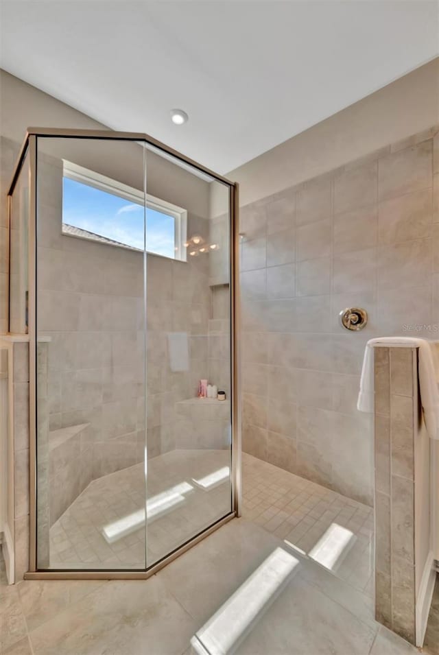5320 Morey Farms Loop, Palmetto, FL 34221 - bathroom with a stall shower and tile patterned floors