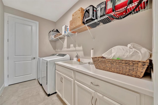 5320 Morey Farms Loop, Palmetto, FL 34221 - washroom with washer and dryer, light tile patterned flooring, and cabinet space