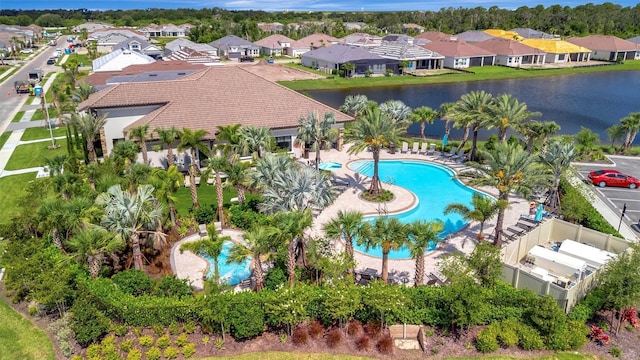 5320 Morey Farms Loop, Palmetto, FL 34221 - aerial perspective of suburban area featuring a pool area and a nearby body of water