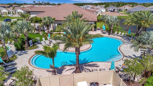 5320 Morey Farms Loop, Palmetto, FL 34221 - community pool with a residential view and a patio