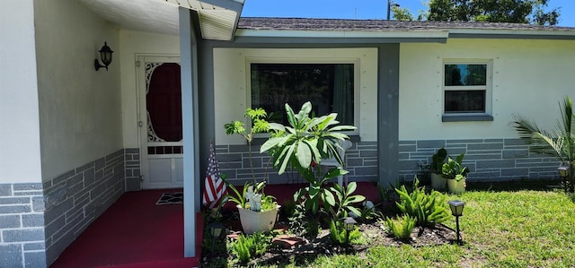 1583 Eunice Ln, Clearwater, FL 33756 - property entrance featuring stucco siding
