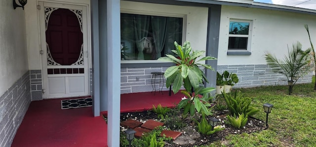 1583 Eunice Ln, Clearwater, FL 33756 - entrance to property featuring stucco siding