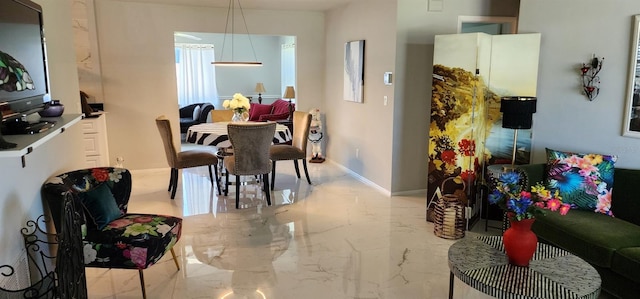 1583 Eunice Ln, Clearwater, FL 33756 - dining area featuring marble tiled floors and baseboards