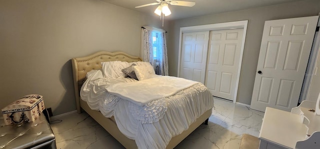 1583 Eunice Ln, Clearwater, FL 33756 - bedroom featuring light marble finish floors, a closet, and a ceiling fan