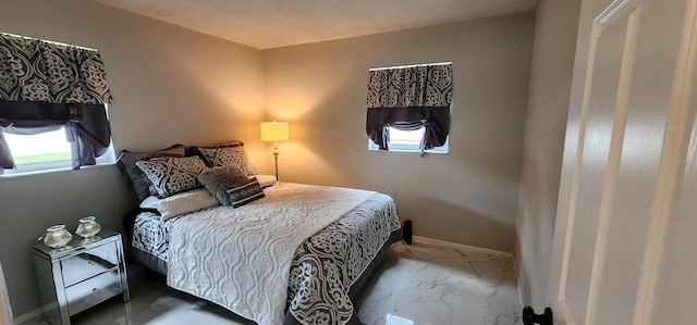 1583 Eunice Ln, Clearwater, FL 33756 - bedroom with marble finish floors and multiple windows