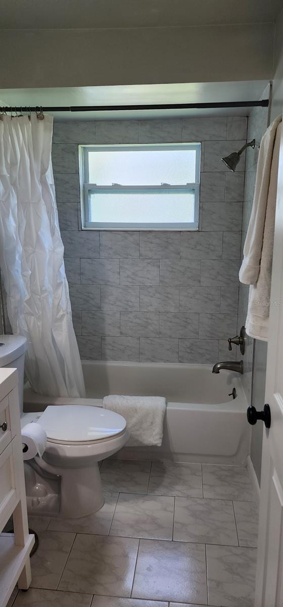 1583 Eunice Ln, Clearwater, FL 33756 - full bathroom featuring shower / bath combination with curtain, healthy amount of natural light, and vanity