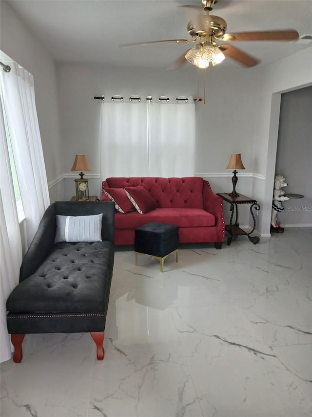 1583 Eunice Ln, Clearwater, FL 33756 - living room with a ceiling fan and marble tiled flooring