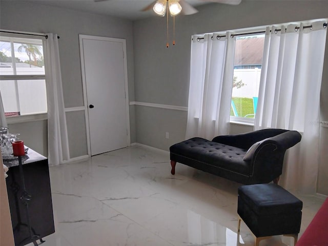 1583 Eunice Ln, Clearwater, FL 33756 - sitting room featuring marble finish floors and a ceiling fan