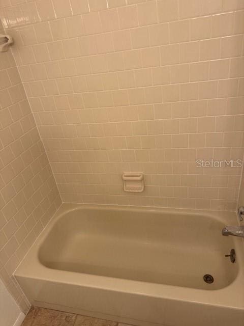 1922 Blue Sage Ct, Brandon, FL 33511 - bathroom featuring bathing tub / shower combination