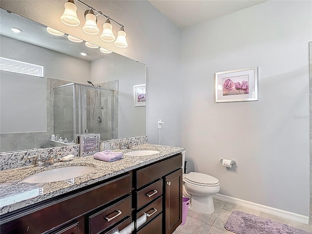 11703 Brighton Knoll Loop, Riverview, FL 33579 - bathroom featuring double vanity and a stall shower