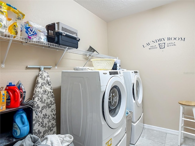 11703 Brighton Knoll Loop, Riverview, FL 33579 - laundry room featuring washer and clothes dryer and tile patterned floors