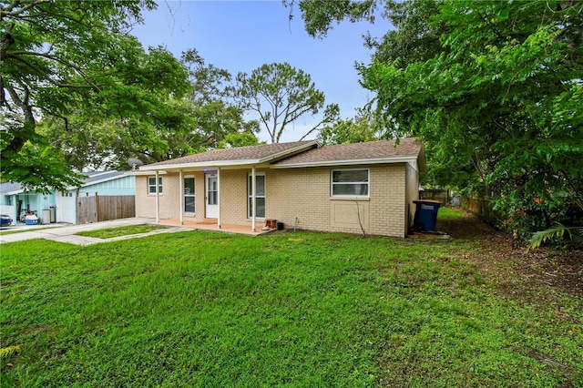1116 Jadewood Ave, Clearwater, FL 33759 - ranch-style home with a patio area, brick siding, and driveway