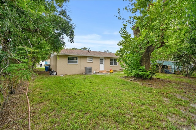 1116 Jadewood Ave, Clearwater, FL 33759 - back of property featuring stucco siding