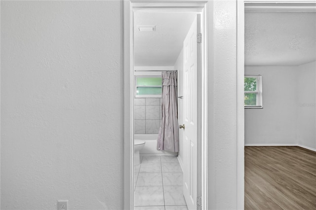 1116 Jadewood Ave, Clearwater, FL 33759 - hall with a textured wall
