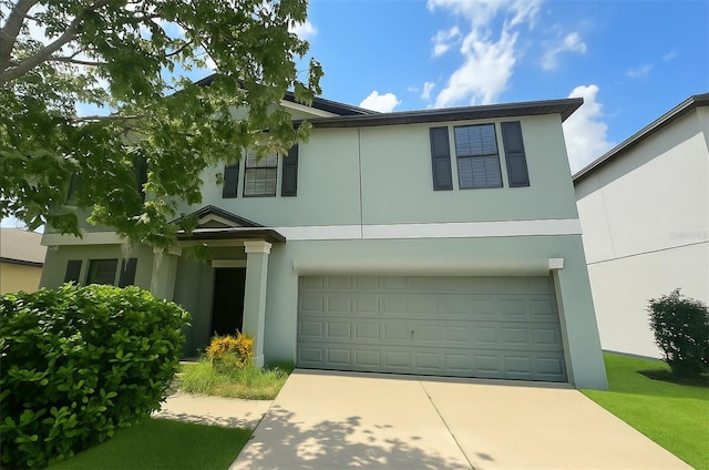 10108 Rosemary Leaf Ln, Riverview, FL 33578 - traditional home with stucco siding, a garage, and concrete driveway