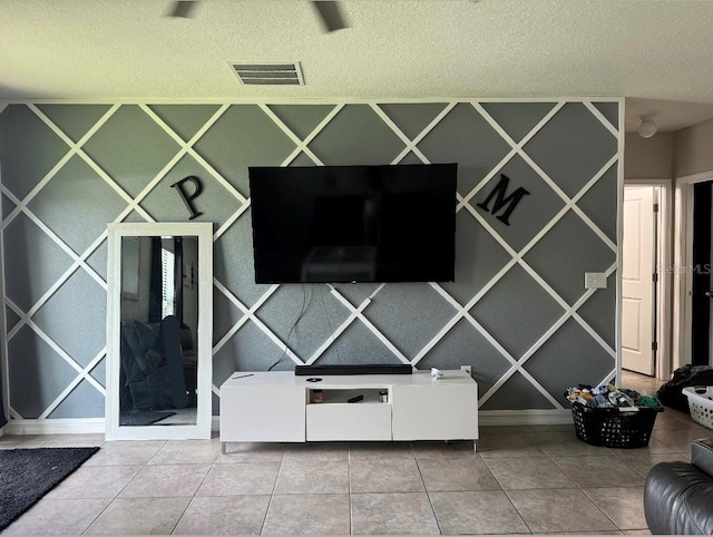 10108 Rosemary Leaf Ln, Riverview, FL 33578 - living room featuring a textured ceiling and tile patterned flooring