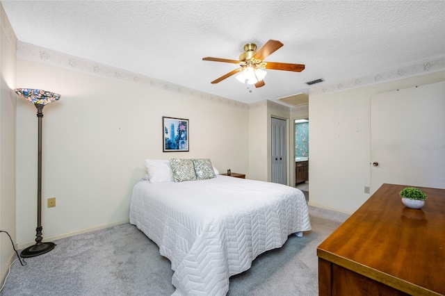 2131 Ridge Rd S Unit 19, Largo, FL 33778 - bedroom with carpet floors, a textured ceiling, and ceiling fan