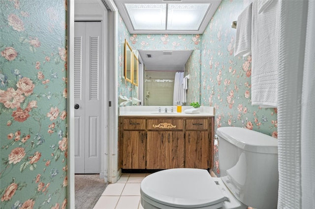 2131 Ridge Rd S Unit 19, Largo, FL 33778 - full bath with a closet, vanity, wallpapered walls, a shower, and tile patterned flooring