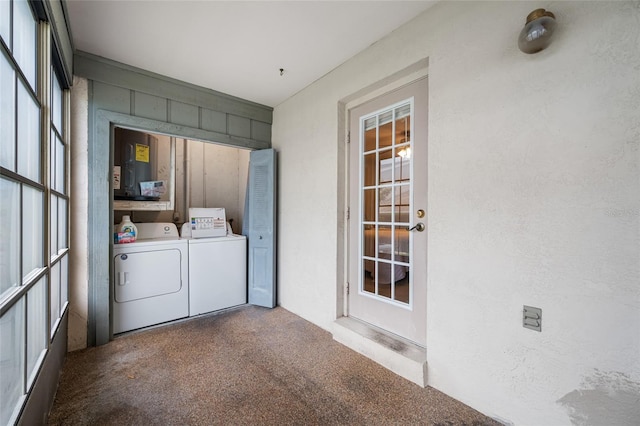 2131 Ridge Rd S Unit 19, Largo, FL 33778 - laundry area featuring independent washer and dryer and carpet floors
