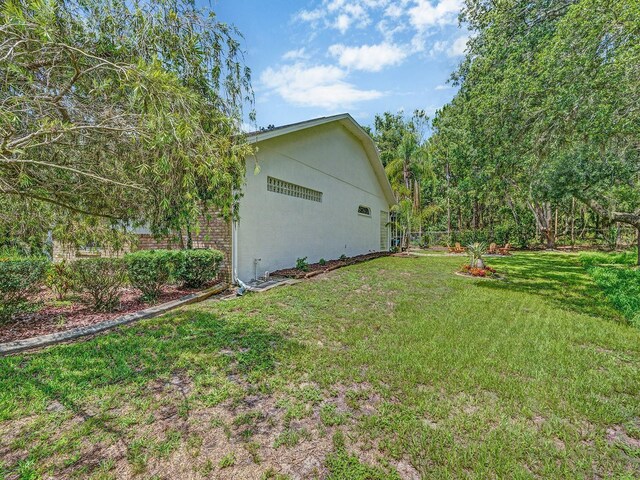 8711 Crescent Forest Blvd, New Port Richey, FL 34654 - view of grassy yard