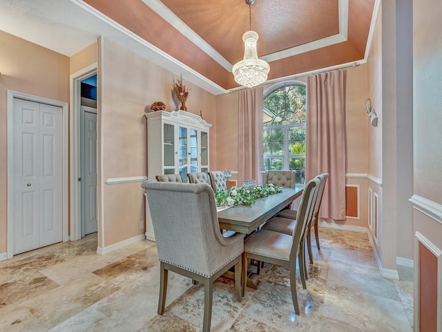 8711 Crescent Forest Blvd, New Port Richey, FL 34654 - dining area featuring a chandelier and a raised ceiling