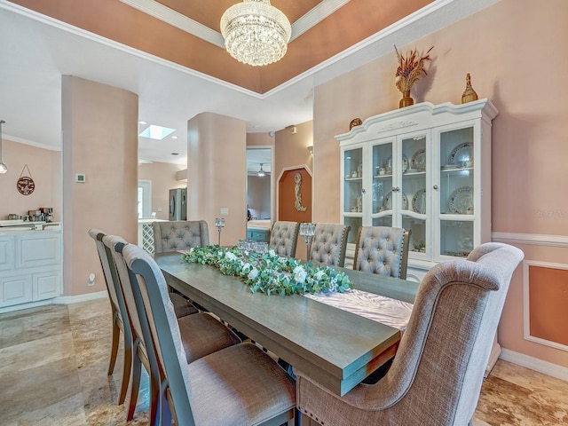 8711 Crescent Forest Blvd, New Port Richey, FL 34654 - dining area with a chandelier and crown molding