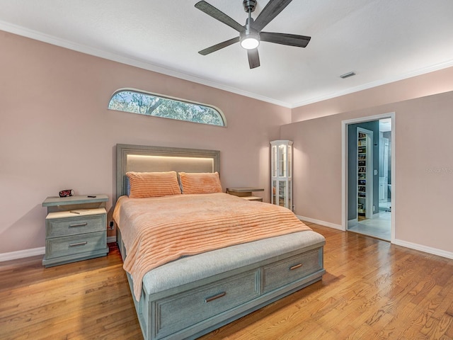 8711 Crescent Forest Blvd, New Port Richey, FL 34654 - bedroom featuring ornamental molding, light wood-style floors, and a ceiling fan