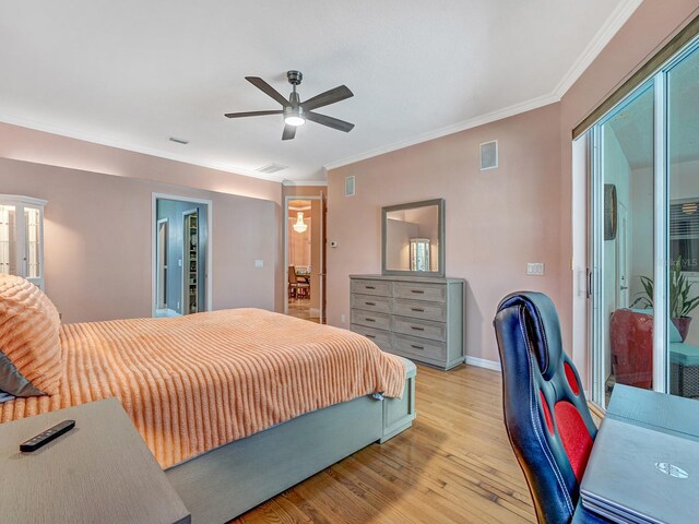 8711 Crescent Forest Blvd, New Port Richey, FL 34654 - bedroom featuring light wood finished floors, ornamental molding, and a ceiling fan